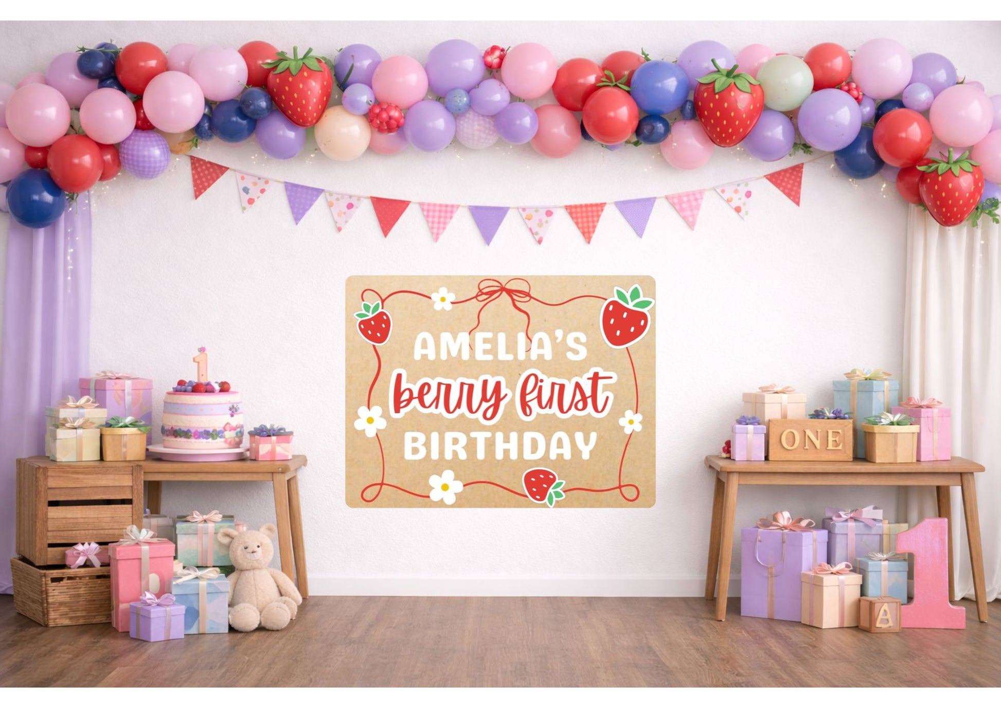 Decorated room for Amelia's berry first birthday with balloons, cake, and gifts.
